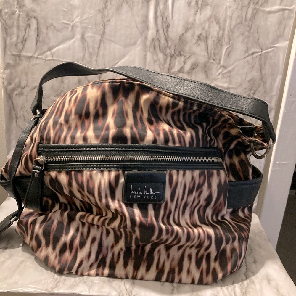 Nicole Miller leopard print adjustable shoulder bag.